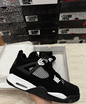 Air Jordan 4 Retro - White Thunder - 2
