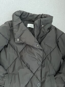 Damska cierna tepla bunda c. 38/M - 2