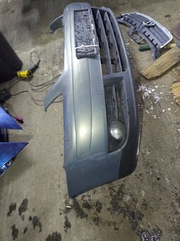 Nárazník vw Touran predfacelift - 2
