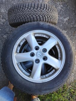 Hliníkové disky 5x114,3 R16 so zimnými pneu na Mazda3 - 2