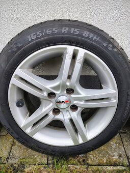 Hlinikové disky. s letnými pneumatikami 165/65 R15 - 2