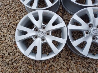 Orig.hlinikove disky Mazda - 3,5,6-6 1/2Jx16-ET-52,5-5x114,3 - 2