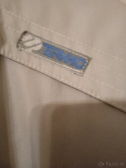 Predám pánsky prešívaný kabát svetlo šedý. - 2