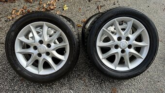 74. Kia Alu disky 205/55R16 - 2