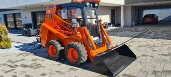 Smykom riadený nakladač Locust 753 - 2