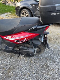 Sym CROX 125 - 2