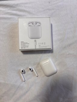 Apple airpods 1 - 2