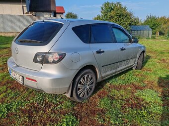 Mazda 3 1.4 benzín  62kw - 2