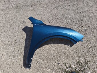 Ford Kuga  pravy blatnik lv4b-s16065 Kuga 3 2020 - - 2