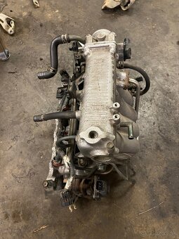 Sacie potrubie grand vitara 1.6 - 2