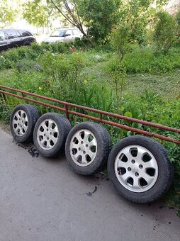 Hliníkové disky R15 4 diery E15x6JH2 46 DOT 4250A095 - 2