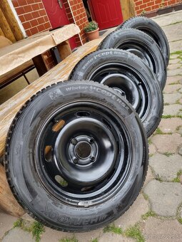 Zimné pneumatiky 185/65 na plechových diskoch R15  4x108 - 2