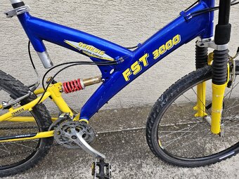 Odpruzeny bicykel genesis fst 3000 - 2