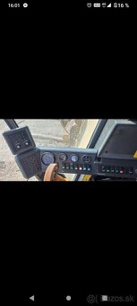 Predam kombajn New Holland TC56 - 2