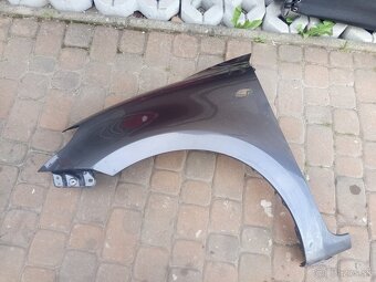 Blatník Suzuki Swift - 2