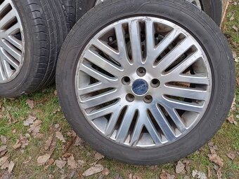 Skoro nove letne pneumatiky 235 45 17+Origo Ford Disky - 2