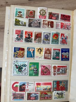 2 albumy poštových známok - 2