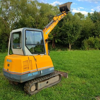 Pasovy bager Libra 125S - 2