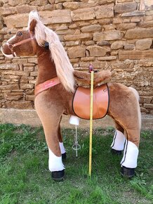 Mechanický jazdiaci kôň. - 2