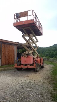 Dieselová nožnicová plošina JLG 4394RT 15m - 2