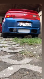 Mazda 323f ba laminátový nárazník zadný - 2