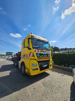 MAN TGX 28.500 6x2 + Faynmonville Megamax F-S42-2GX - 2