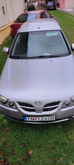 Nissan Almera N16 2005 benzin - 2