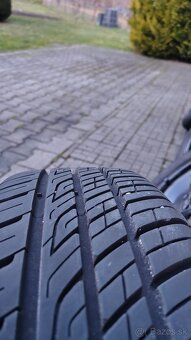 Letné gumy na diskoch 185x60 R14 - 2