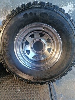31x10,5 R15 - 2