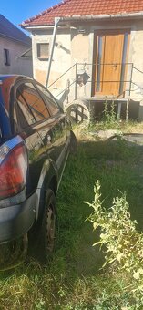 Peugeot 607 a Kia rio - 2