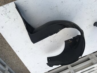 Prední lavý podblatník FABIA II - 2