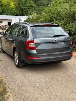 Rozpredam Škoda Octavia 3 1.6 TDi 81kw kombi šedá . Kod farb - 2