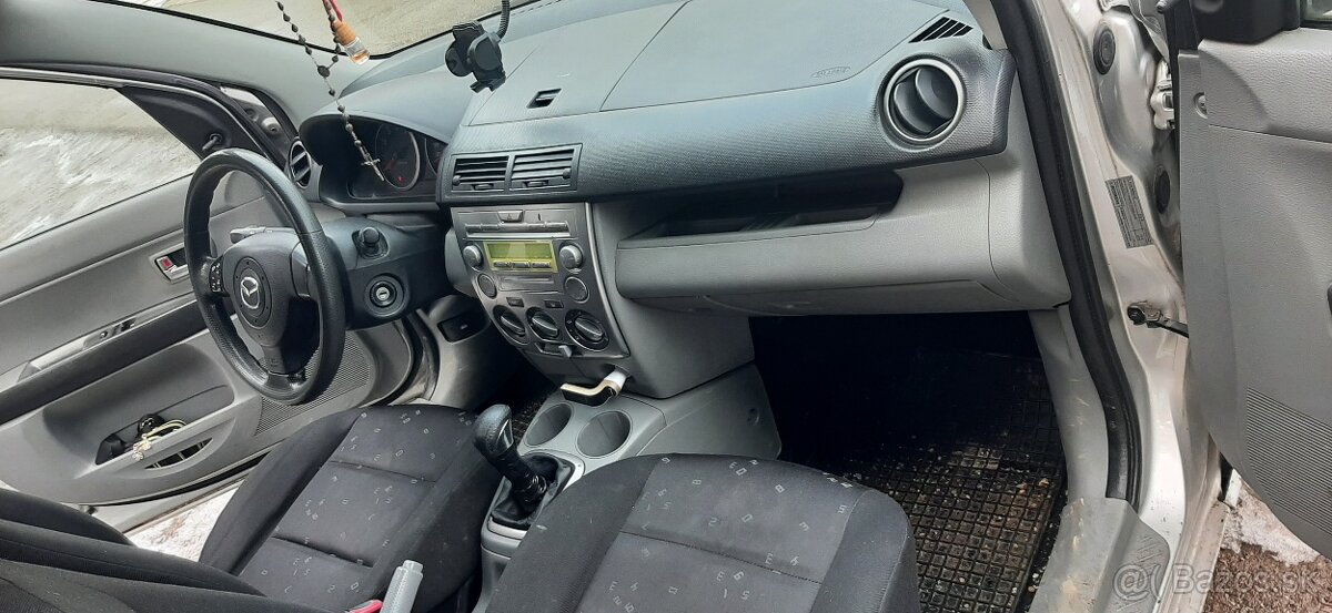 Mazda 2 .2004 - 3