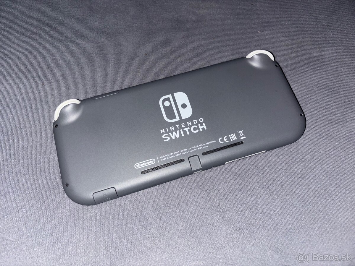 Nintendo switch Lite 256Gb z krytom a 34 hry - 3