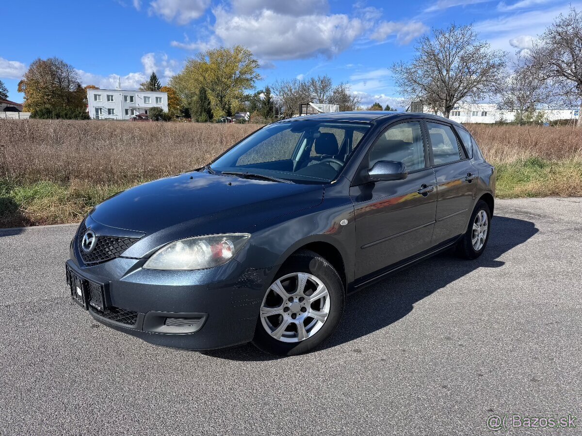 Mazda 3 1.4i - 3