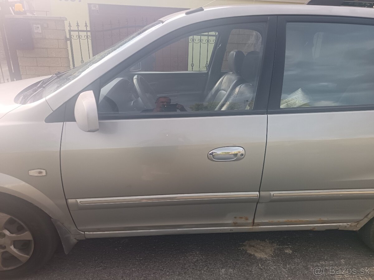 Kia carens - 3