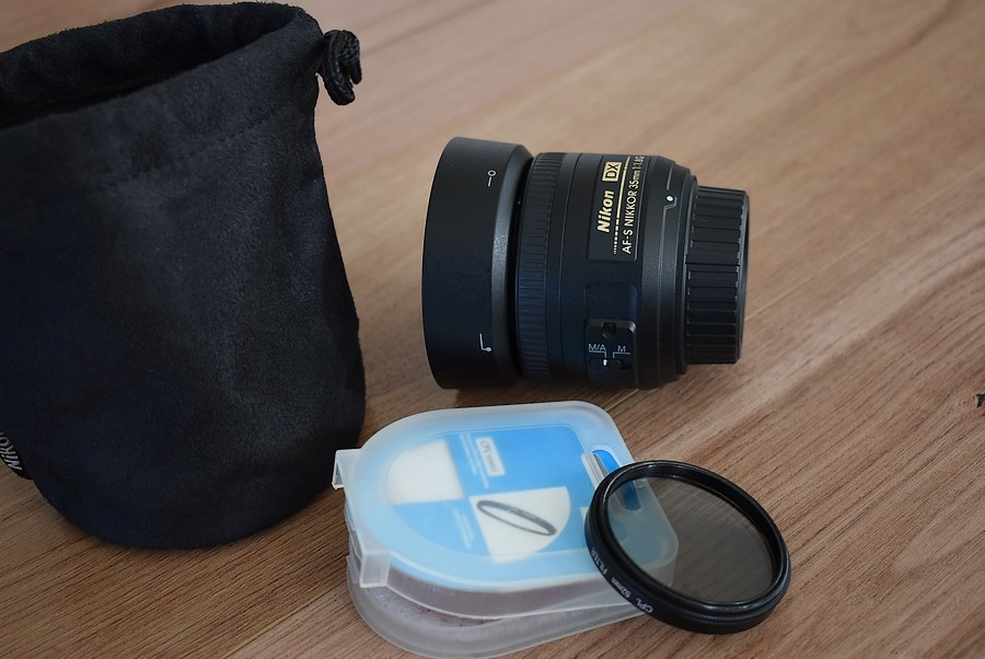 Nikkor 35 mm AF-s 1,8G nikon - clona krytky vrecko + filter - 3