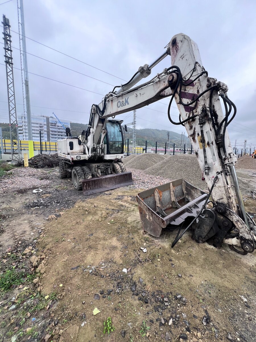 Kolesový bager O&K / Power MH 5.5 - 3