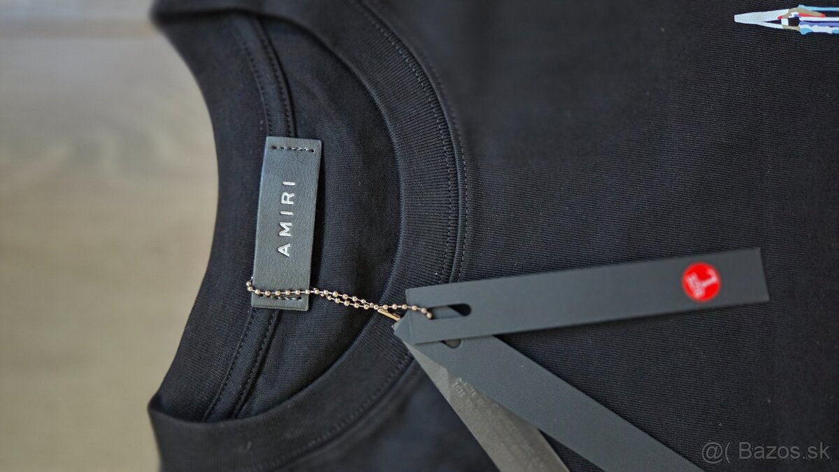 Amiri Paint Drip logo - 3