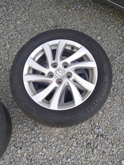 16" alu MAZDA + letné pneu originál. - 3