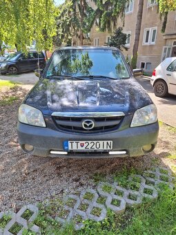 Mazda Tribute - 3