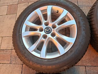 hlinikové disky org.Mazda 3---R16 - 3
