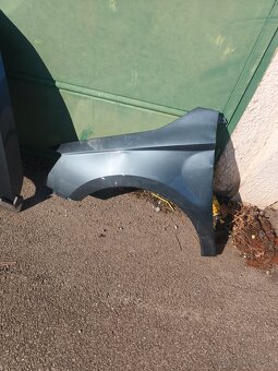 Blatník + kapota na Fabiu 3. - 3