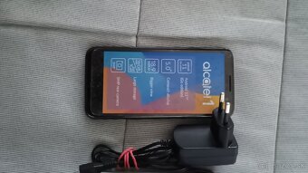 Alcatel1 - 3
