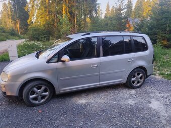 Volkswagen. Touran - 3