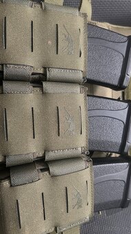 Vesta zo sumkami - 3