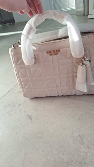 Guess - 3