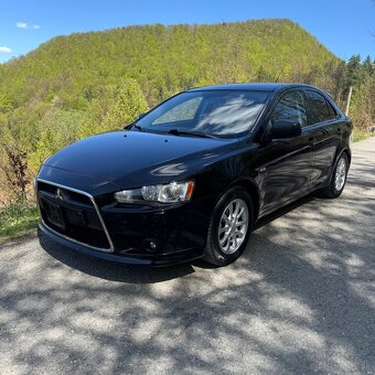 Mitsubishi lancer 1,8di-d,110kw - 3