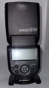 blesk Canon Speedlite 430EX III-RT a blesk Yongnuo YN560 III - 3