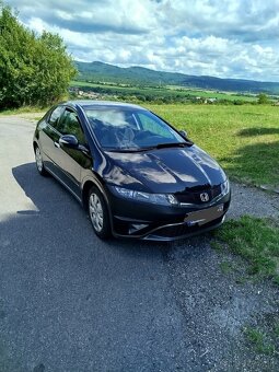 Honda Civic 1,4 73kw - 3